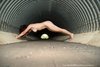 Nude Sportive Girl On All Fours in Tunnel
