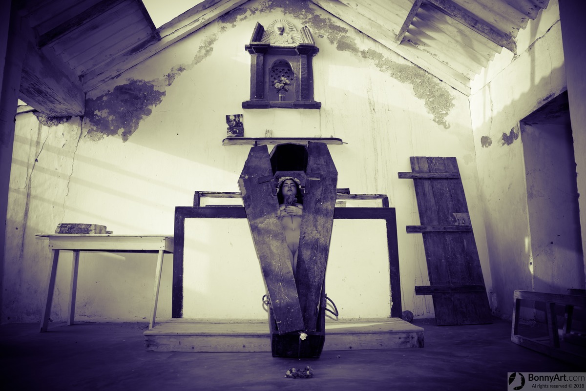 Dead Girl Nude in the Coffin inside Chapel