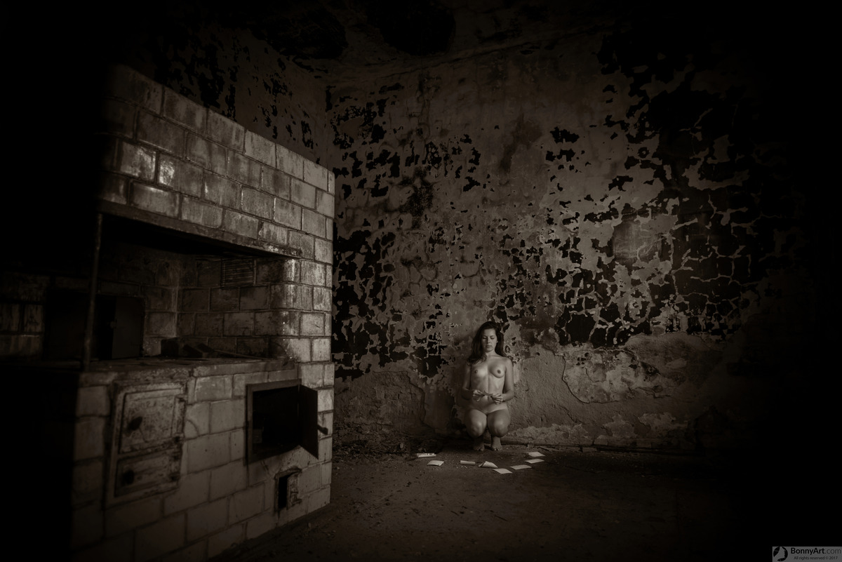 Nude Girl Reading Old Postcards in Haunted House