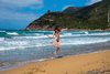Candid Nudist Girl Jumping on the Beach