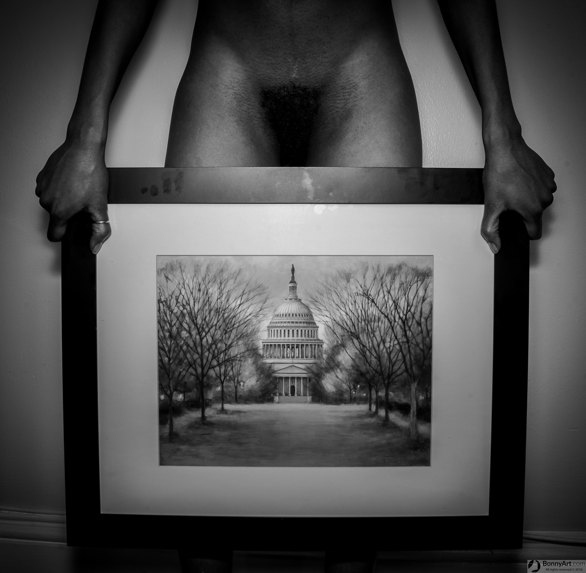 Bushy Afro Holding Washington' Capitol Painting