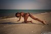 Brown African Hot Model Naked on all fours on the Beach