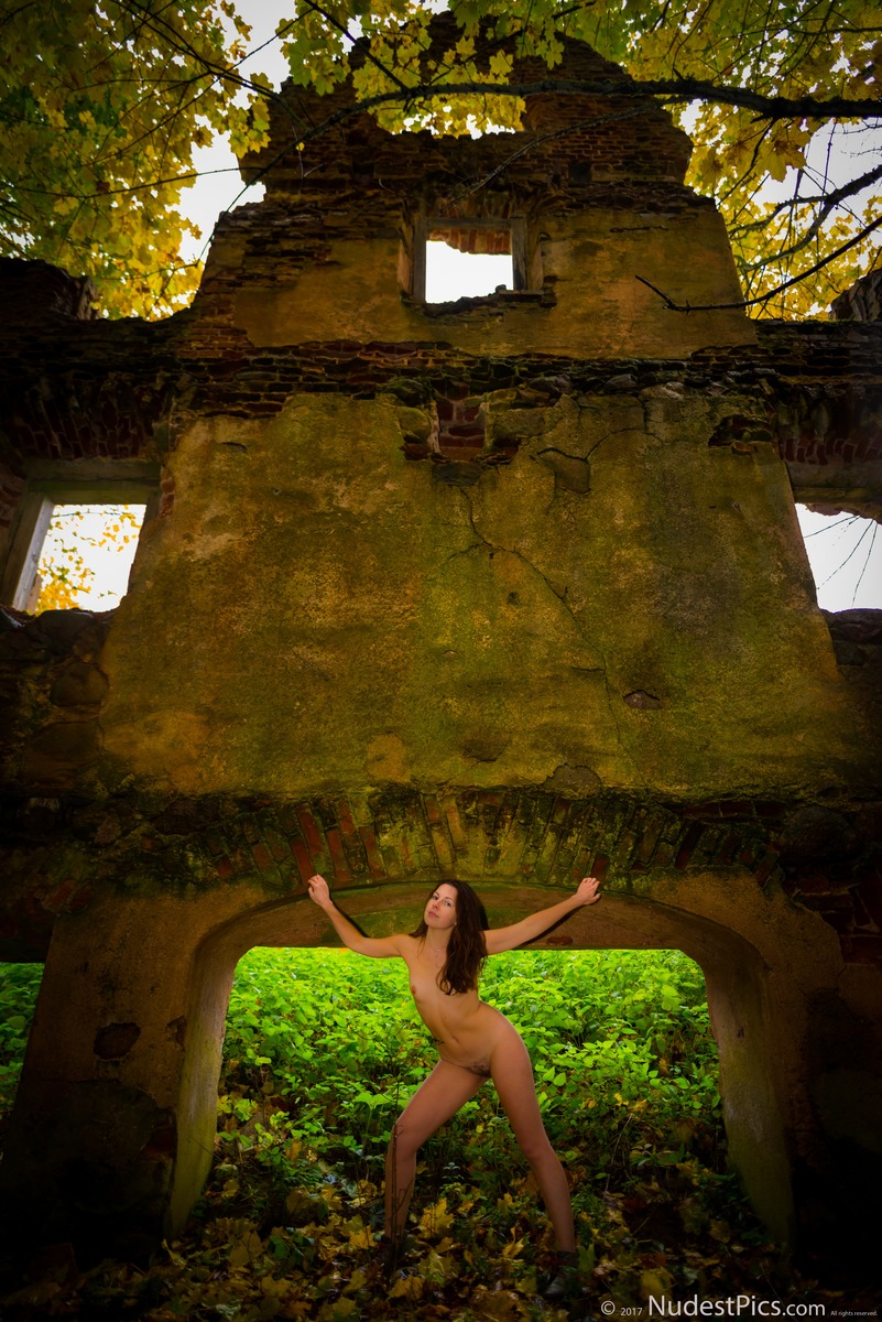 Nude Girl Posing at the Ruined Wall