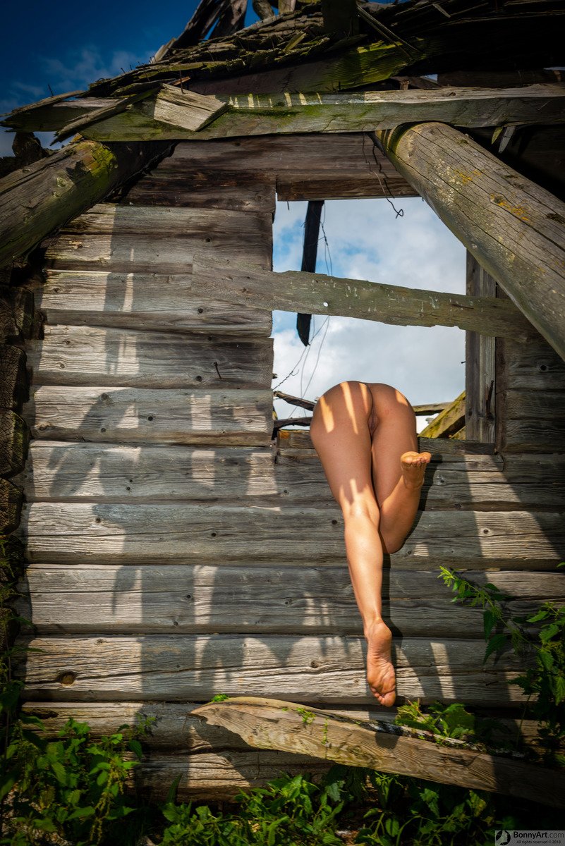 Naked Butt Bent Over the Abandoned Hut's Window
