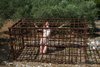 Nude Girl Locked in a Rusty Steel Cage